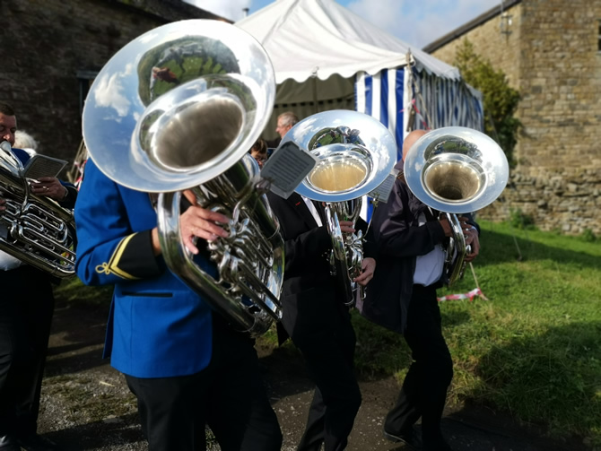 Muker Silver Band marching onto the Muker Showfield in Swaledale